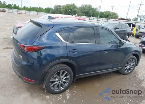 2021 Mazda Cx-5 Signature z USA, uszkodzony, nr VIN JM3KFBEY1M0343561